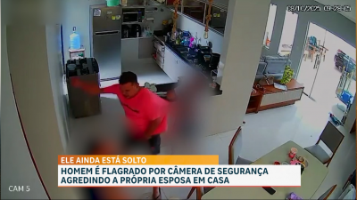 Câmeras de segurança flagram suspeito agredindo a própria esposa em casa